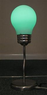 Lamp illuminated in as green